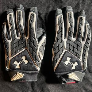 Under Armour black & white Combat padded lineman gloves.  Size XL used.